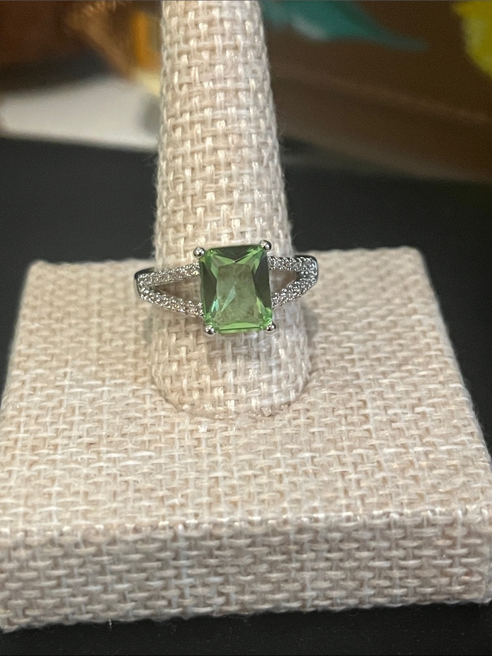 Sterling Silver Ring with Emerald-Cut Green Gemstone and Pavé Band